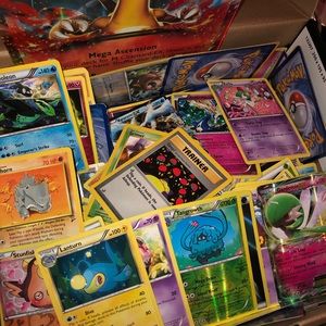 Shoe box filled with Pokémon cards